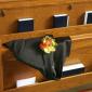 Groom's Tux on Pew